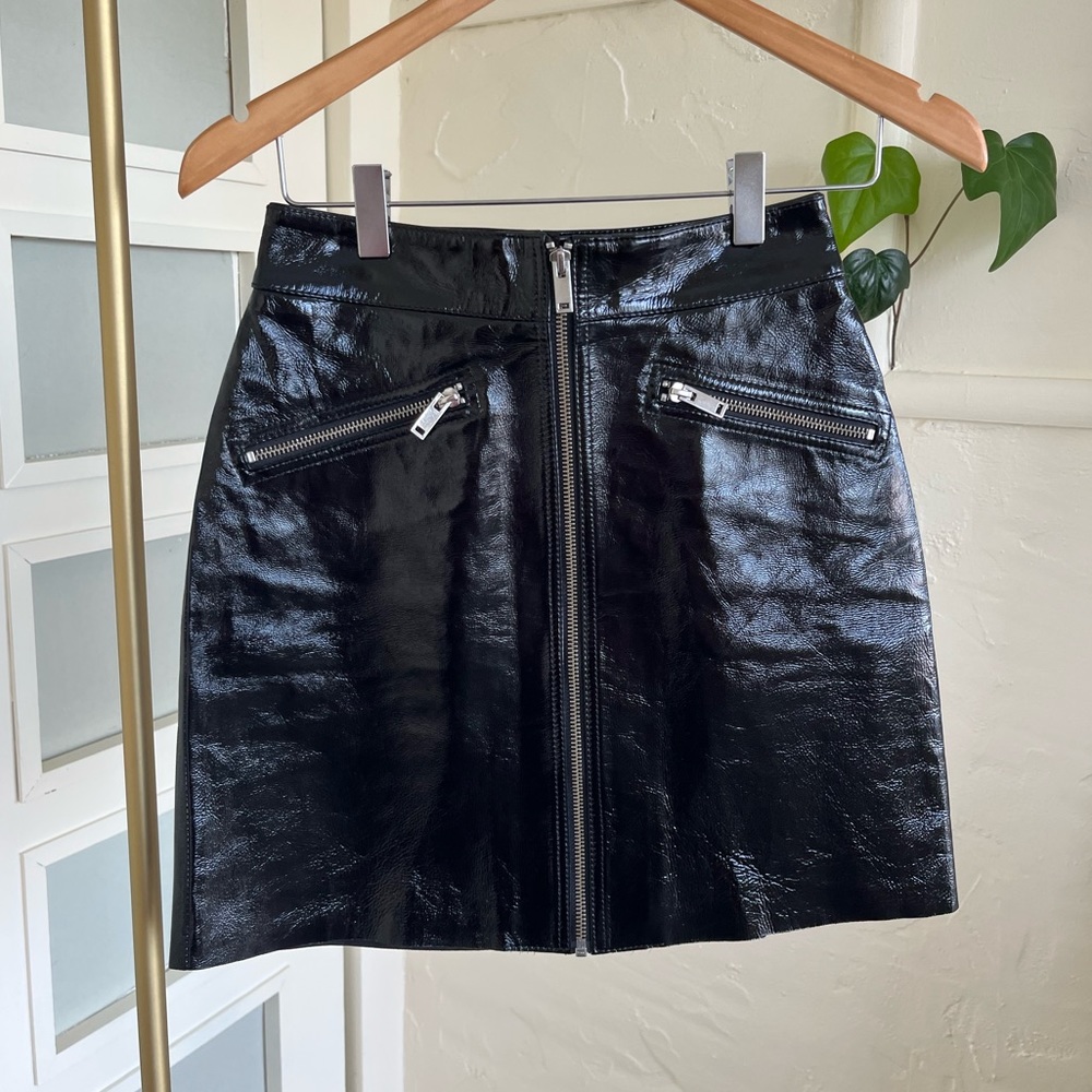 Brand New w/ tags Maje patent leather skirt with front zip closure and lining